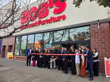 Bob's Discount Furniture celebrated its grand opening on Northern Boulevard with a ribbon-cutting ceremony Friday morning. Photo by Shane O'Brien.