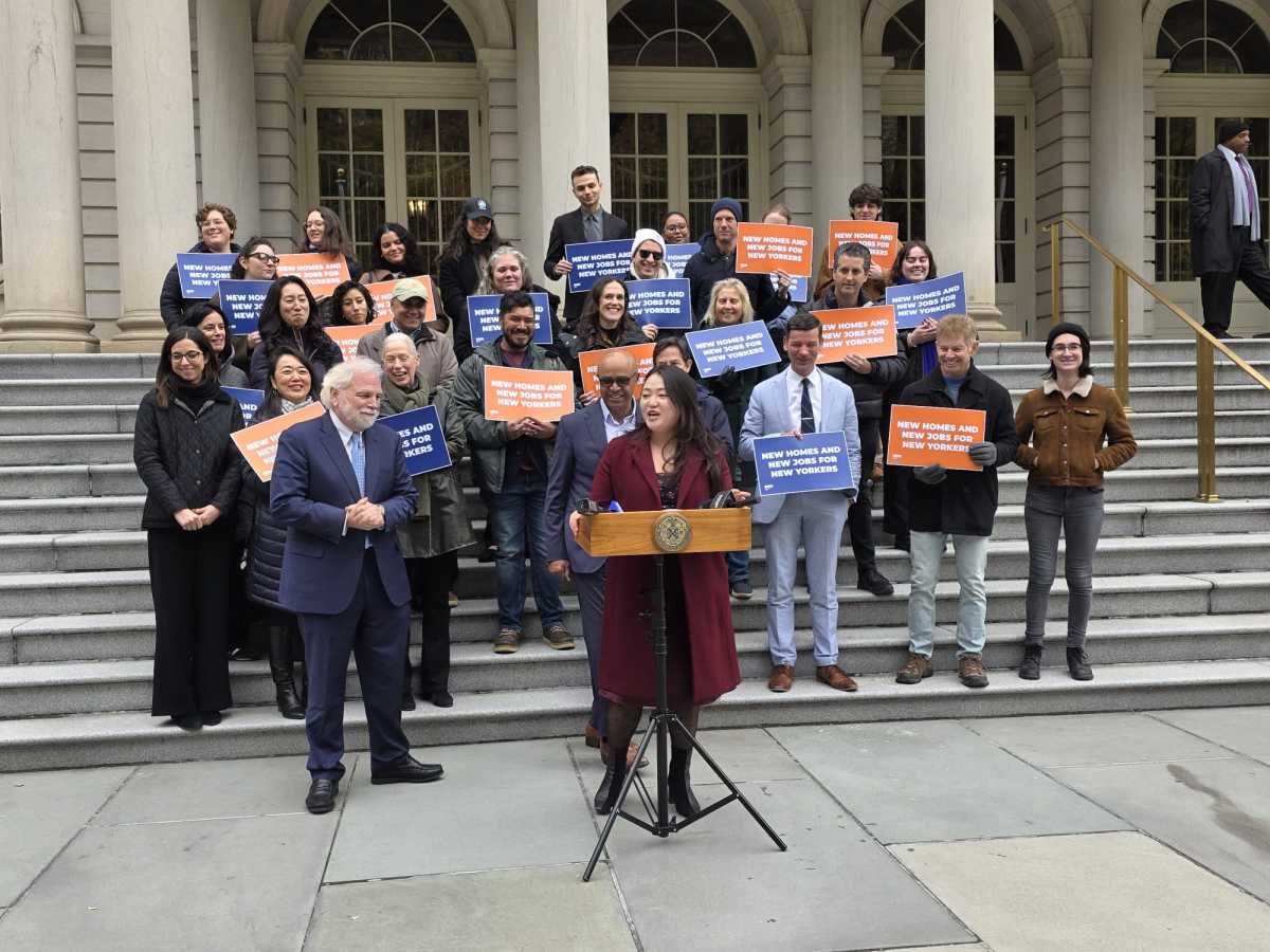 Council Member Julie Won speaks at a press conference celebrating the passage of the OneLIC Neighborhood Plan on the steps of City Hall Wednesday afternoon. Photo by Shane O'Brien.