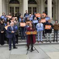 Council Member Julie Won speaks at a press conference celebrating the passage of the OneLIC Neighborhood Plan on the steps of City Hall Wednesday afternoon. Photo by Shane O'Brien.