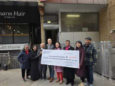 Council Member Sandra Ung, Council Speaker Adrienne Adams and AAFE leadership at an event announcing $1.3 million in funding for the organization. Photo by Shane O'Brien.