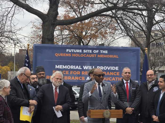 Queens Borough President Donovan Richards speaks at the official announcement of a Queens Holocaust Memorial at Borough Hall on Tuesday. Photo by Shane O'Brien.