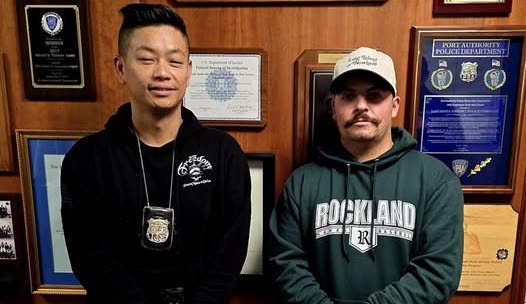 Port Authority Police Officers Danny Sun (l.) and Joseph Picillo witnessed an assault in progress in Terminal B at LaGuardia Airport and chased after the suspect before arresting him with help from other officers.