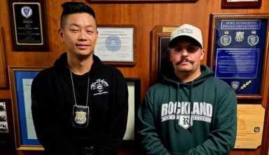 Port Authority Police Officers Danny Sun (l.) and Joseph Picillo witnessed an assault in progress in Terminal B at LaGuardia Airport and chased after the suspect before arresting him with help from other officers.
