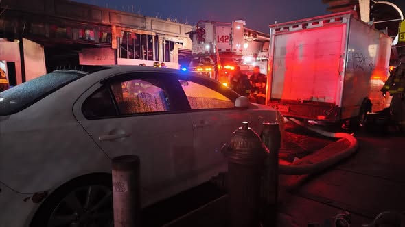Civilian injured after two-alarm fire breaks out in Ozone Park auto body shop: FDNY - QNS