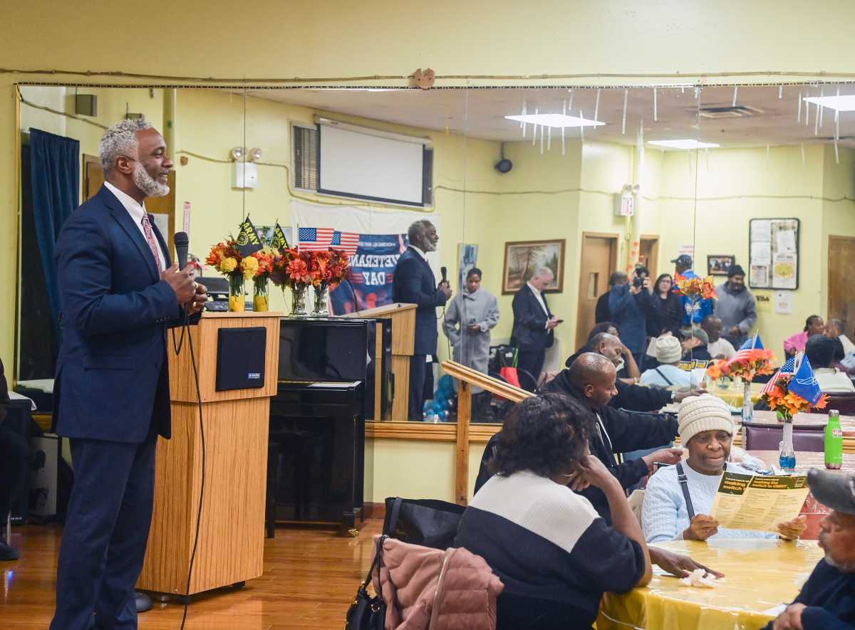NYC Transit President Demetrius Crichlow visited the Robert Couche Senior Center to discuss the switch from the MetroCard to the new OMNY tap and ride system.