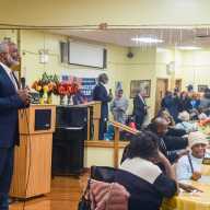 NYC Transit President Demetrius Crichlow visited the Robert Couche Senior Center to discuss the switch from the MetroCard to the new OMNY tap and ride system.