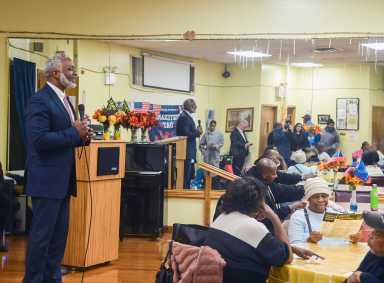 NYC Transit President Demetrius Crichlow visited the Robert Couche Senior Center to discuss the switch from the MetroCard to the new OMNY tap and ride system.