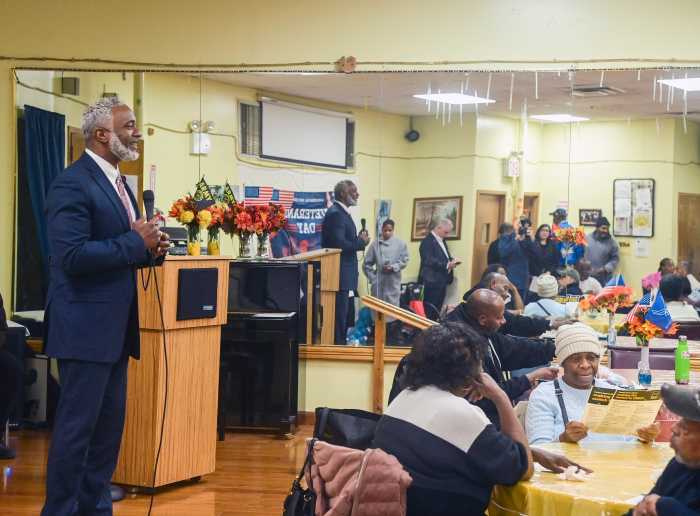 NYC Transit President Demetrius Crichlow visited the Robert Couche Senior Center to discuss the switch from the MetroCard to the new OMNY tap and ride system.