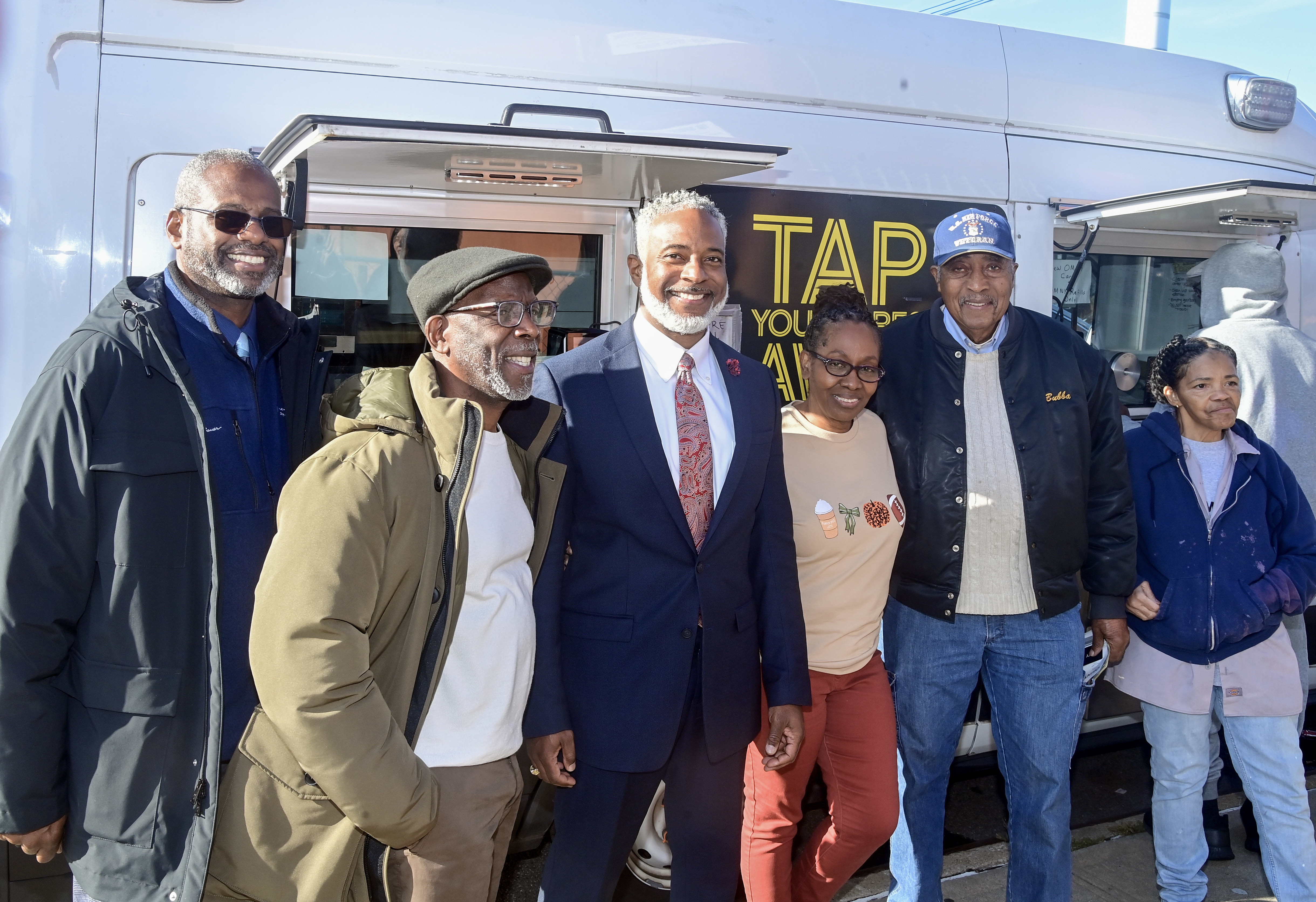 NYC Transit President Demetrius Crichlow visited the Robert Couche Senior Center to discuss the switch from the MetroCard to the new OMNY tap and ride system.