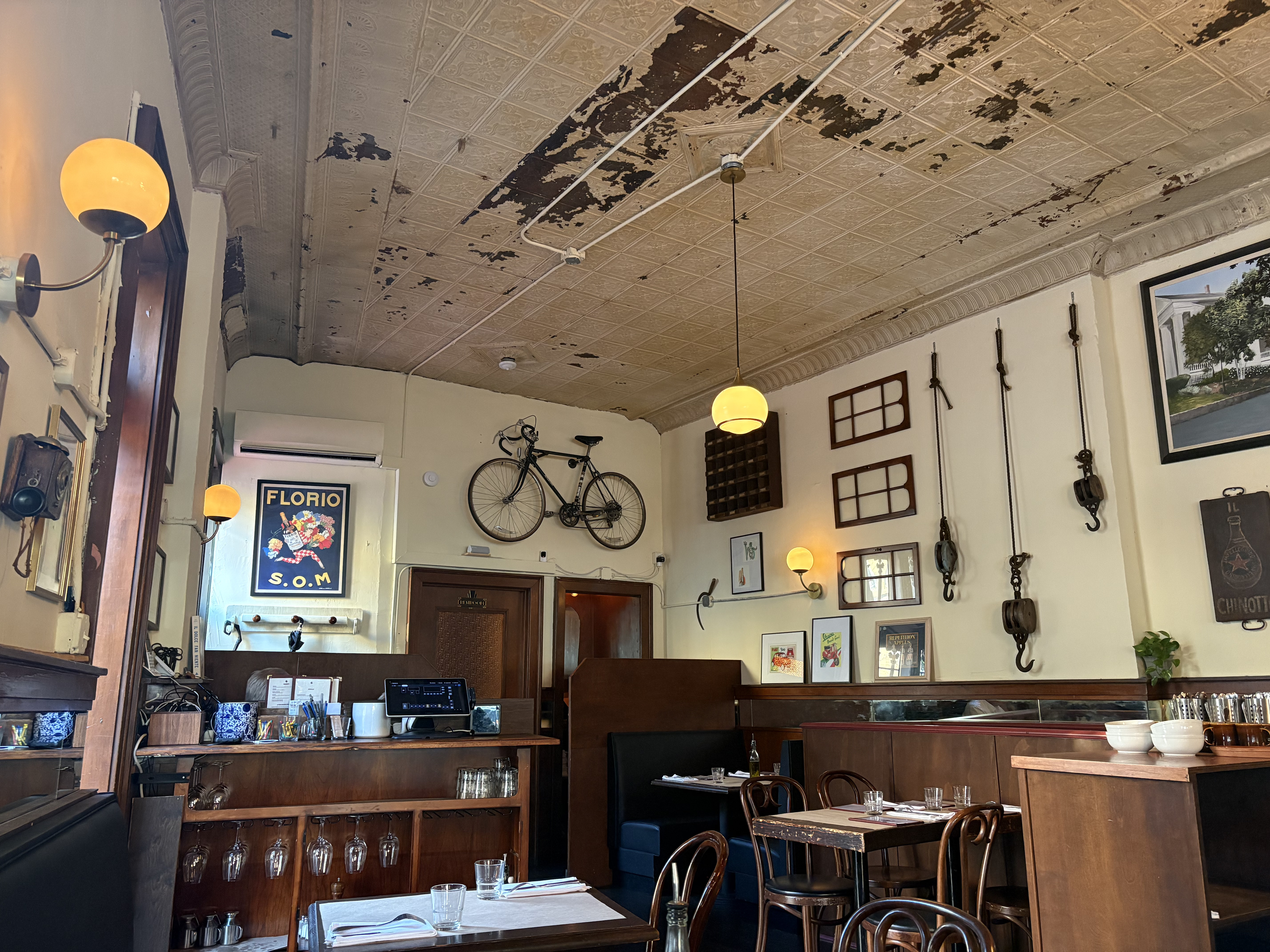 The walls of Il Gigante in Ridgewood are adorned with vintage Italian antiques that hearken back to the homeland.