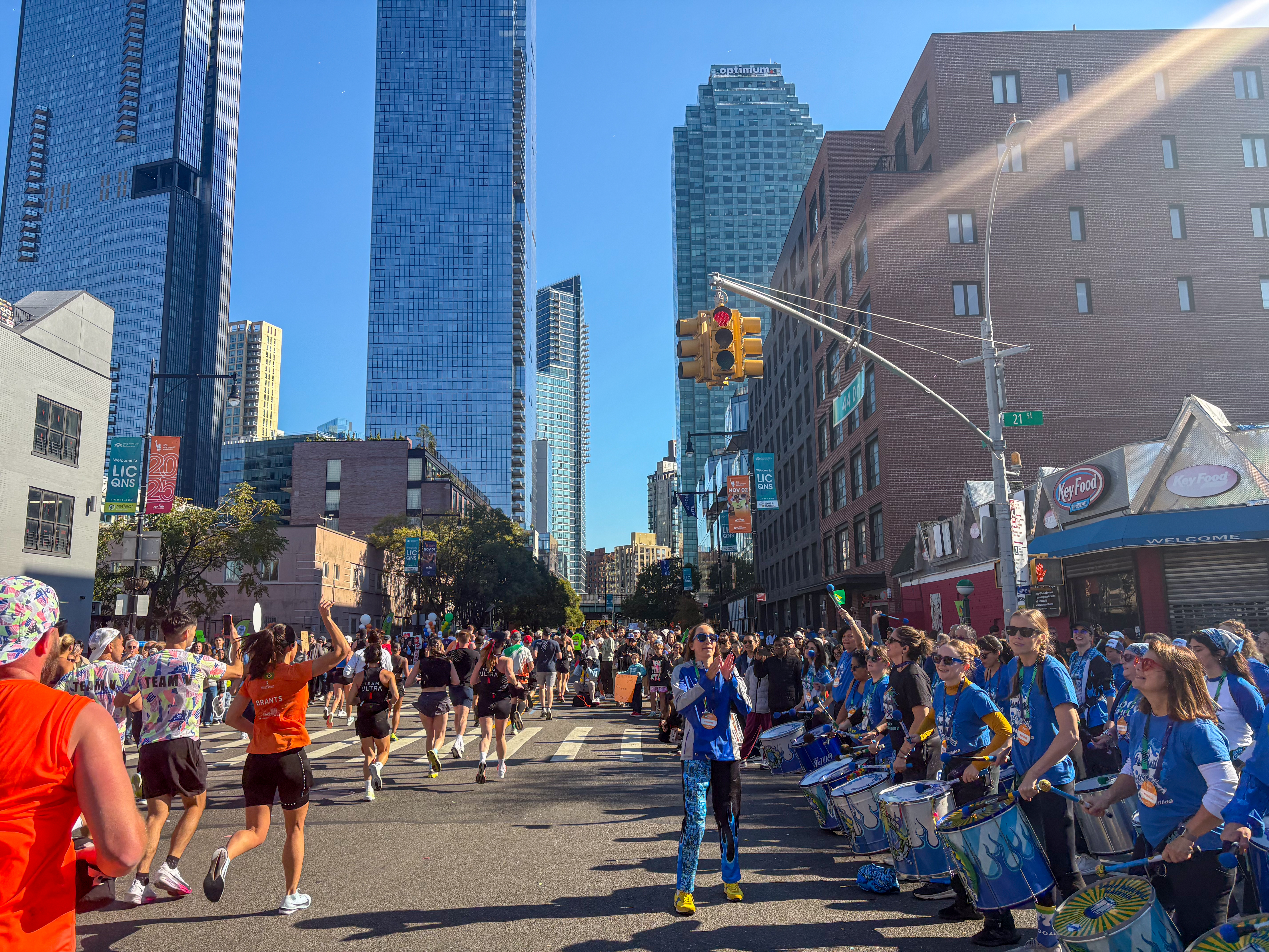 Fogo Azul NYC, the Brazilian samba-reggae drumline, at 44th Drive and 21st Street in Long Island City supporting the marathoners with music.