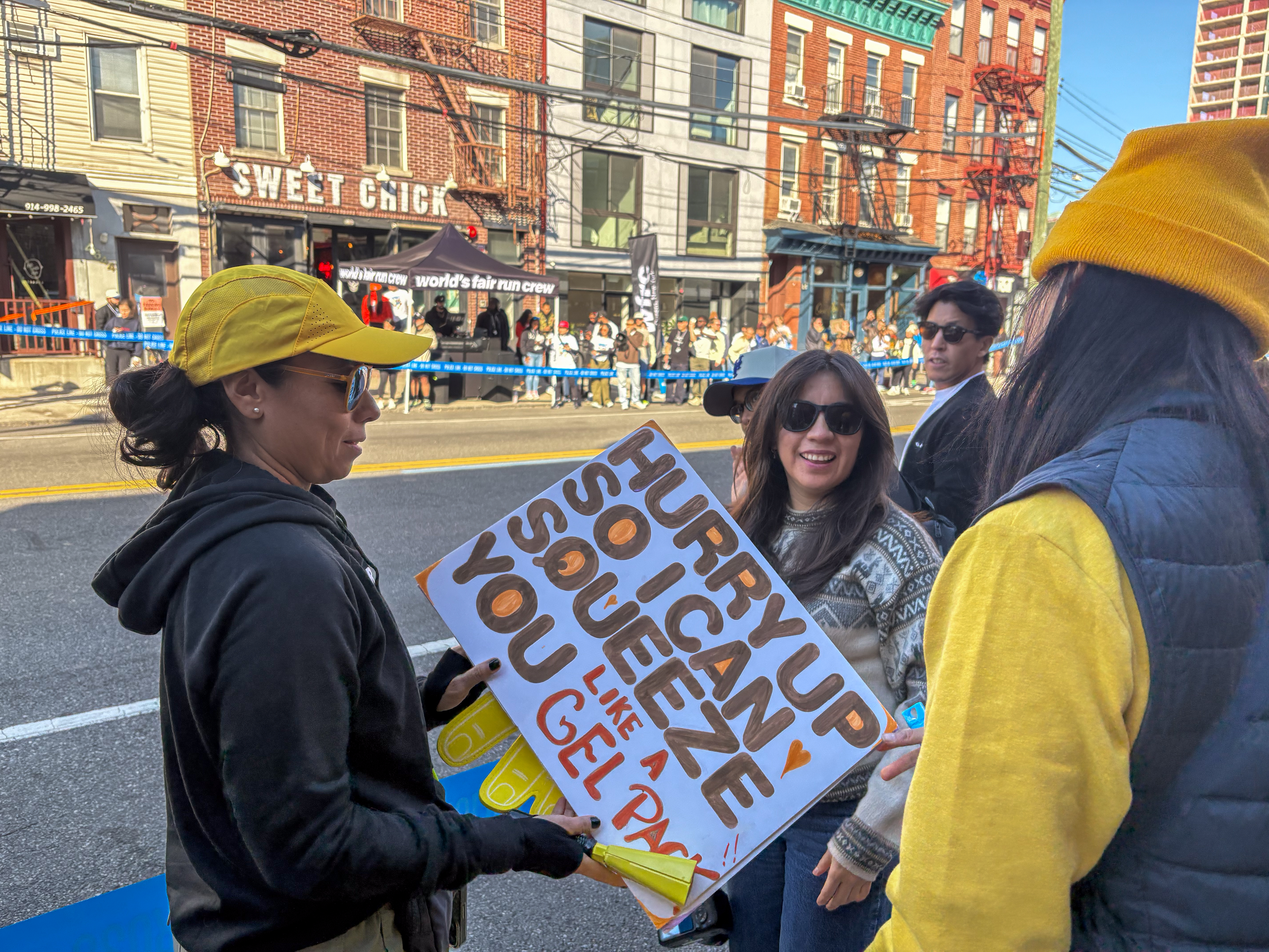 A pair of spectators at Vernon Boulevard in Long Island City.