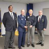 State Sen. John Liu receives an award for Check Pilot of the Year. Photo via New York Wing of the Civil Air Patrol.