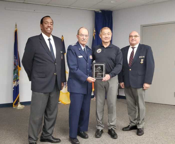State Sen. John Liu receives an award for Check Pilot of the Year. Photo via New York Wing of the Civil Air Patrol.