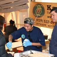 Kam Rai Thai serves guests at the fourth annual International Food Expo. Photo by Ramy Mahmoud.