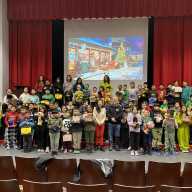 Council Member Sandra Ung with P.S. 122Q students at a recent holiday giveaway. Photo via CM Sandra Ung Twitter.