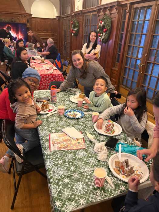 Local families decorate gingerbread houses at Oak Ridge. Photo courtesy of office of Council Member Joann Ariola.