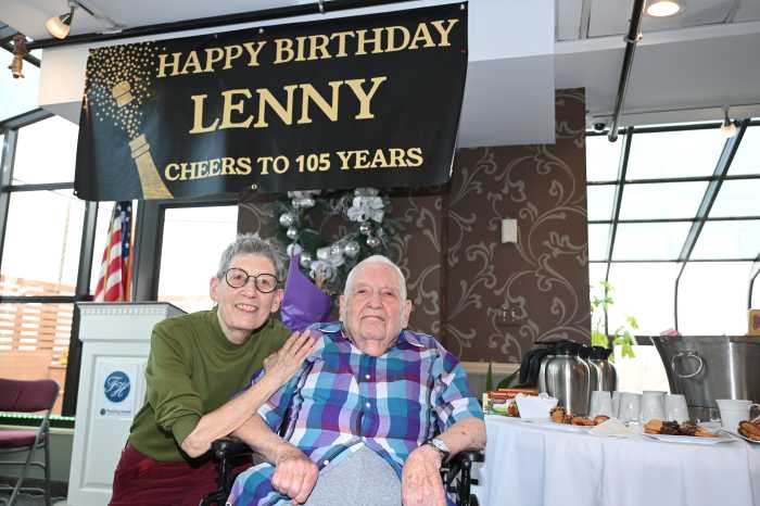 Vogel with his daughter Wind. Photo by Ramy Mahmoud.
