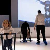 Guests glide through NYSCI's "Space Glide" rink. Photo via the New York Hall of Science.
