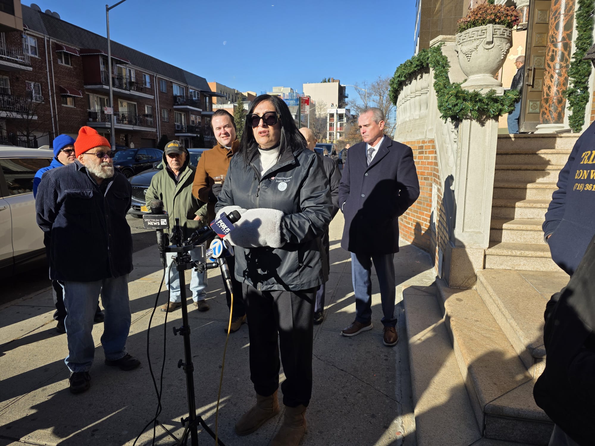 Council Member Joann Ariola speaks at a press conference celebrating a court ruling ordering the DOT to halt plans for a protected bike lane on 31st Street. Photo by Shane O'Brien.