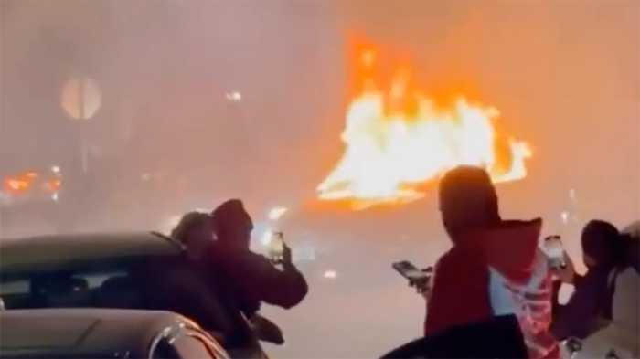 A Far Rockaway teen was arrested and charged with gang assault and riot for beating a Malba homeowner on the night of a violent street takeover in which the crazed mob torched a security guard's vehicle.