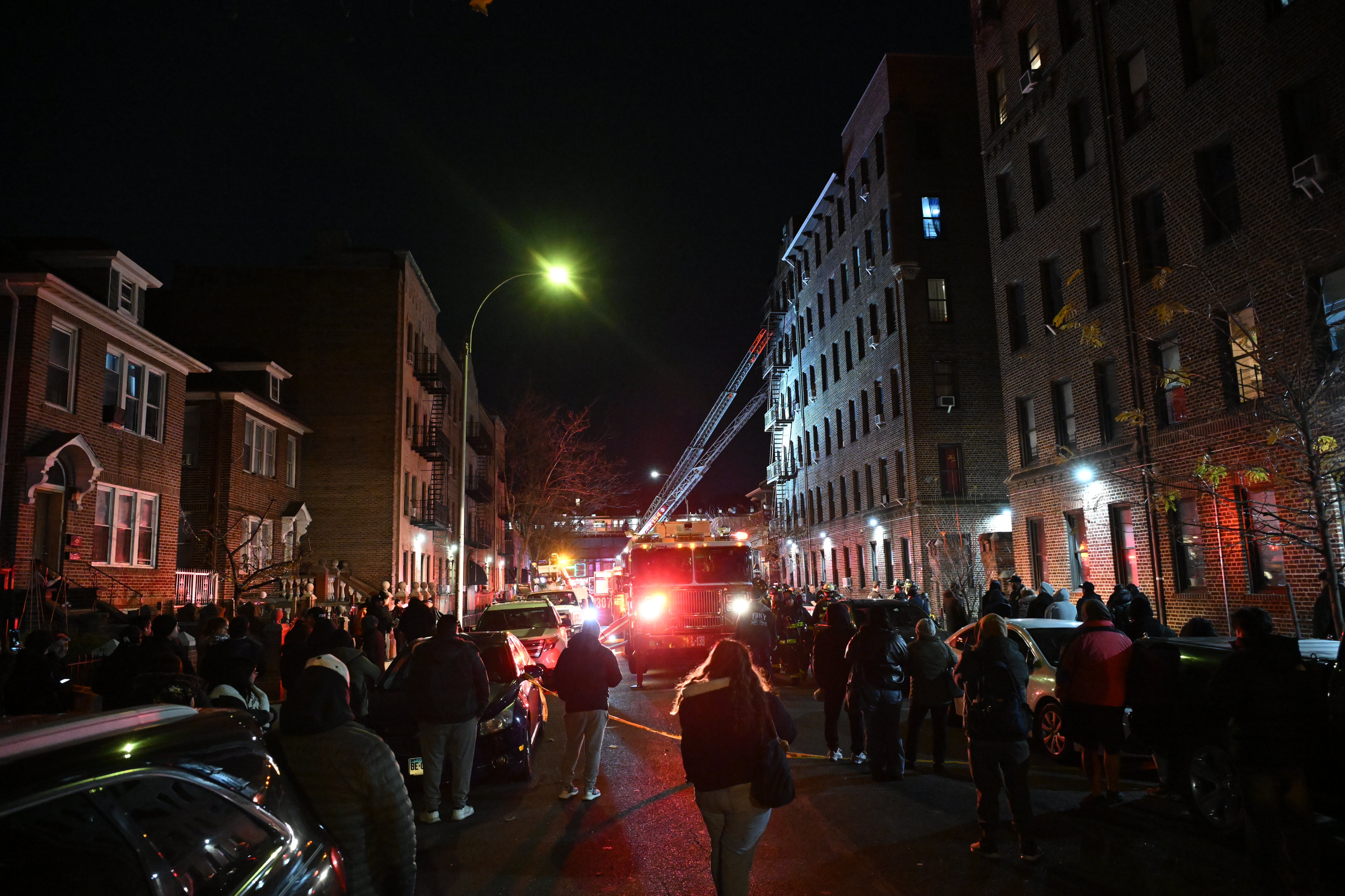 The FDNY battled a 2-alarm fire on the upper floors of an apartment building at 37-52 89th St. in Jackson Heights that displaced 27 adults and four children. 
