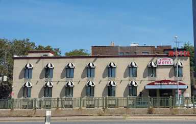 An NYPD recruit is accused of raping a woman at the Woodside Motor Inn on Queens Boulevard in October.