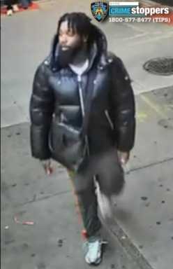 Cops are looking for this suspect for allegedly slashing a young man in the face in what is believed to be an unprovoked attack on Steinway Street in Astoria.