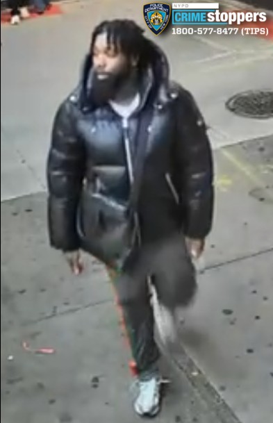 Cops are looking for this suspect for allegedly slashing a young man in the face in what is believed to be an unprovoked attack on Steinway Street in Astoria.