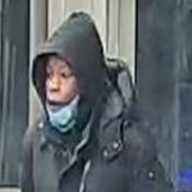 A commercial robbery suspect was caught on camera leaving a Woodhaven cell phone store with $5,000 with of stolen devices in his hands.