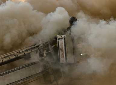 Firefighters battled a fatal fire in Astoria on Thursday mormon on the top floor of a 14-story apartment building in the Queensview coop complex on Crescent Street.