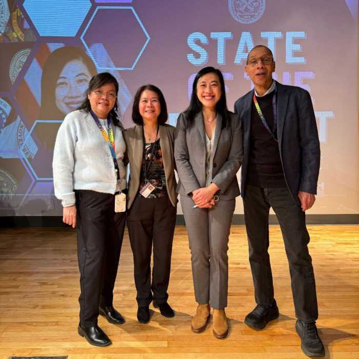 Ung pictured with Queens Public Library President Dennis Walcott following her State of the District address. Photo via CM Sandra Ung. 