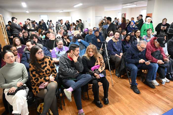Crowds packed into the Powhatan and Pocahontas Democratic Club for the forum. Photo by Ramy Mahmoud.
