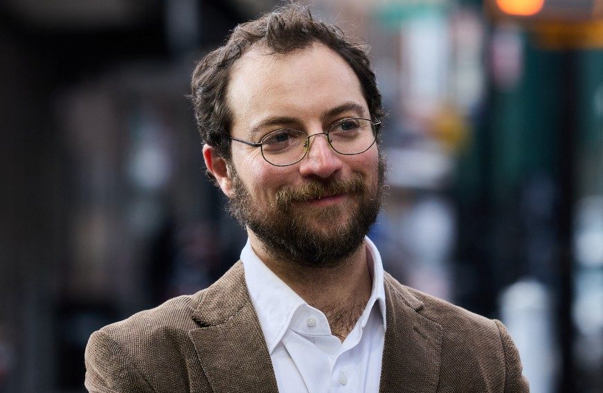 DSA member David Orkin has launched a campaign to primary AM Jenifer Rajkumar in the 38th Assembly District. Photo via David4Queens Instagram.