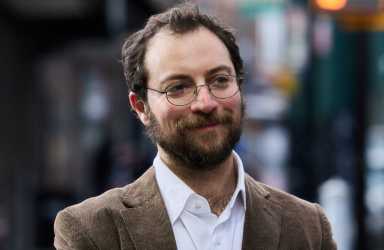 DSA member David Orkin has launched a campaign to primary AM Jenifer Rajkumar in the 38th Assembly District. Photo via David4Queens Instagram.