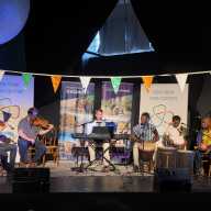 Irish and Ghanian musicians perform as part of the Crossroad Concert series at the New York Irish Center's 2025 Queens Irish Heritage Festival. Photo by Shane O'Brien.