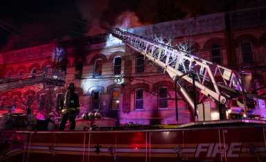 The five-alarm fire at 1824 Madison St. in Ridgewood spread to adjoining buildings and hundreds of firefighters battled the blaze for more than five hours.