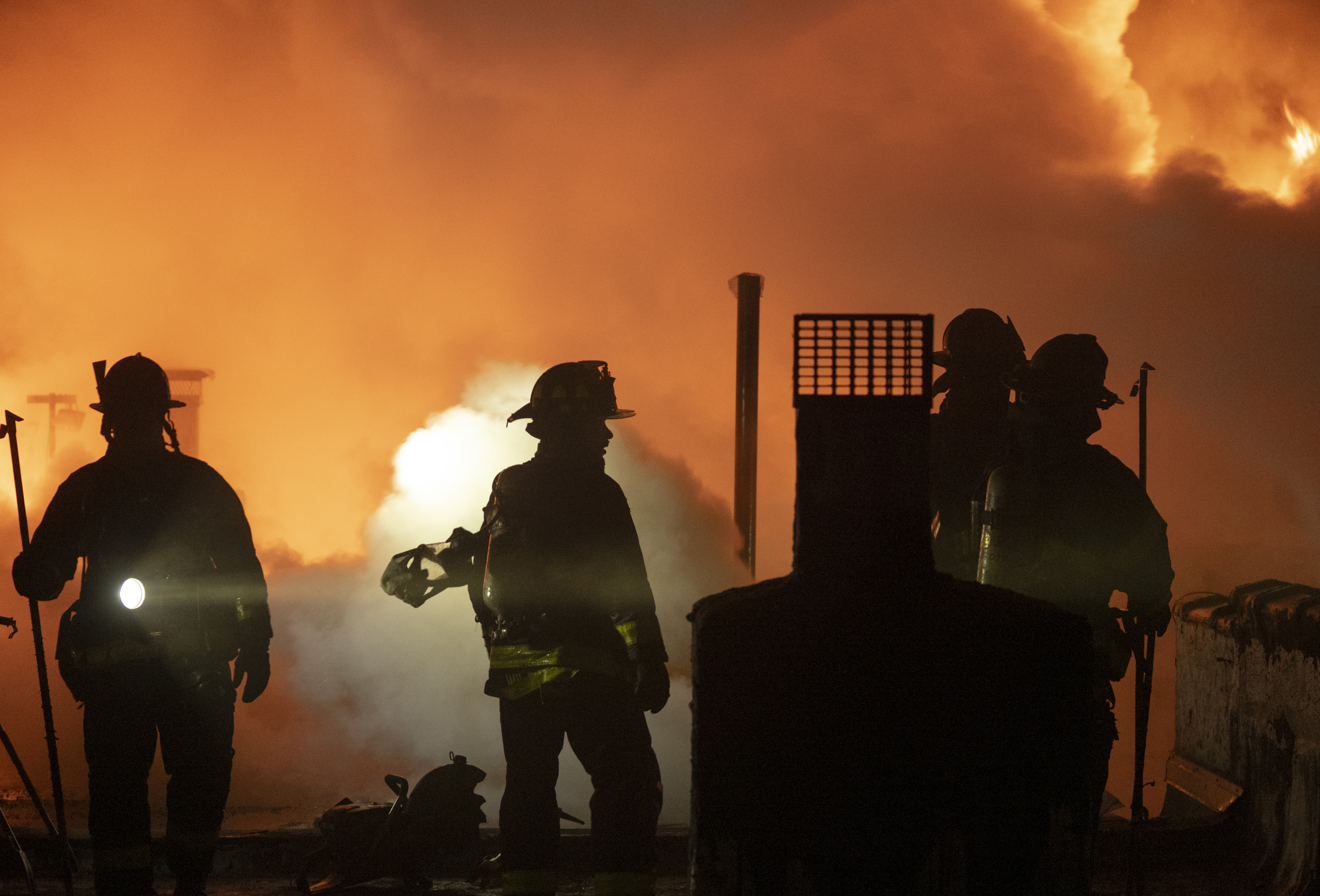 The five-alarm fire at 1824 Madison St. in Ridgewood spread to adjoining buildings and hundreds of firefighters battled the blaze for more than five hours.