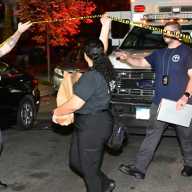 Crime scene investigators from the 115th Precinct gathered evidence from the home at 26-30 96th St. in East Elmhurst following the fatal shooting on the night of Sept. 12, 2025.