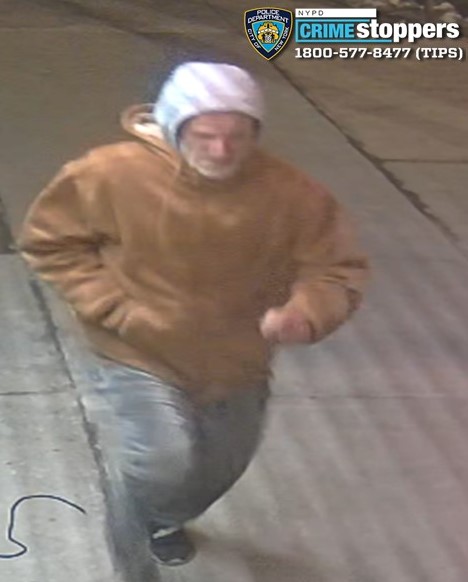 The suspect is described as having a light complexion with a gray beard and mustache remains at large nearly a month after the heist. 