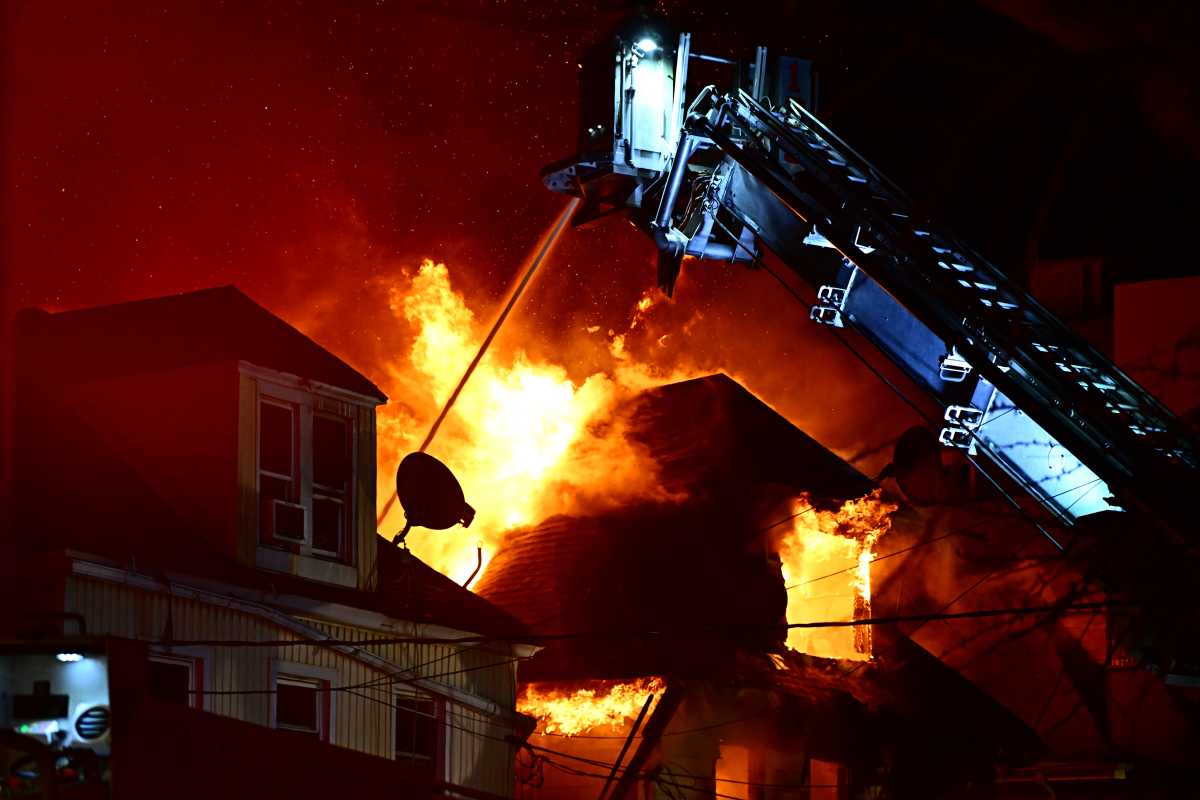 Three homes gutted during fatal 4-alarm fire on Dongan Avenue in Elmhurst on Monday: FDNY - QNS