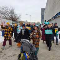 Assembly District 36 candidate Diana Moreno makes her way to P.S. 166Q accompanied by supporters. Voting remains ongoing in the Feb. 3 special election. Photo by Shane O'Brien.