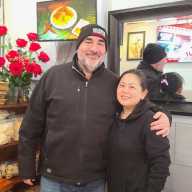 Queens Together founder Jonathan Forgash alongside Asian Taste 86 owner Rosalinda Lie. Lieis profiding food relief to victims of the Dongan Avenue fire. Photo via Queens Together.