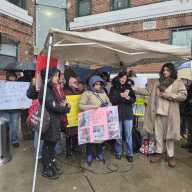 Mesa Verde tenant Mirela Bugalia speaks at Sunday's rally demanding A&E make repairs at the six-building complex. Photo by Shane O'Brien.