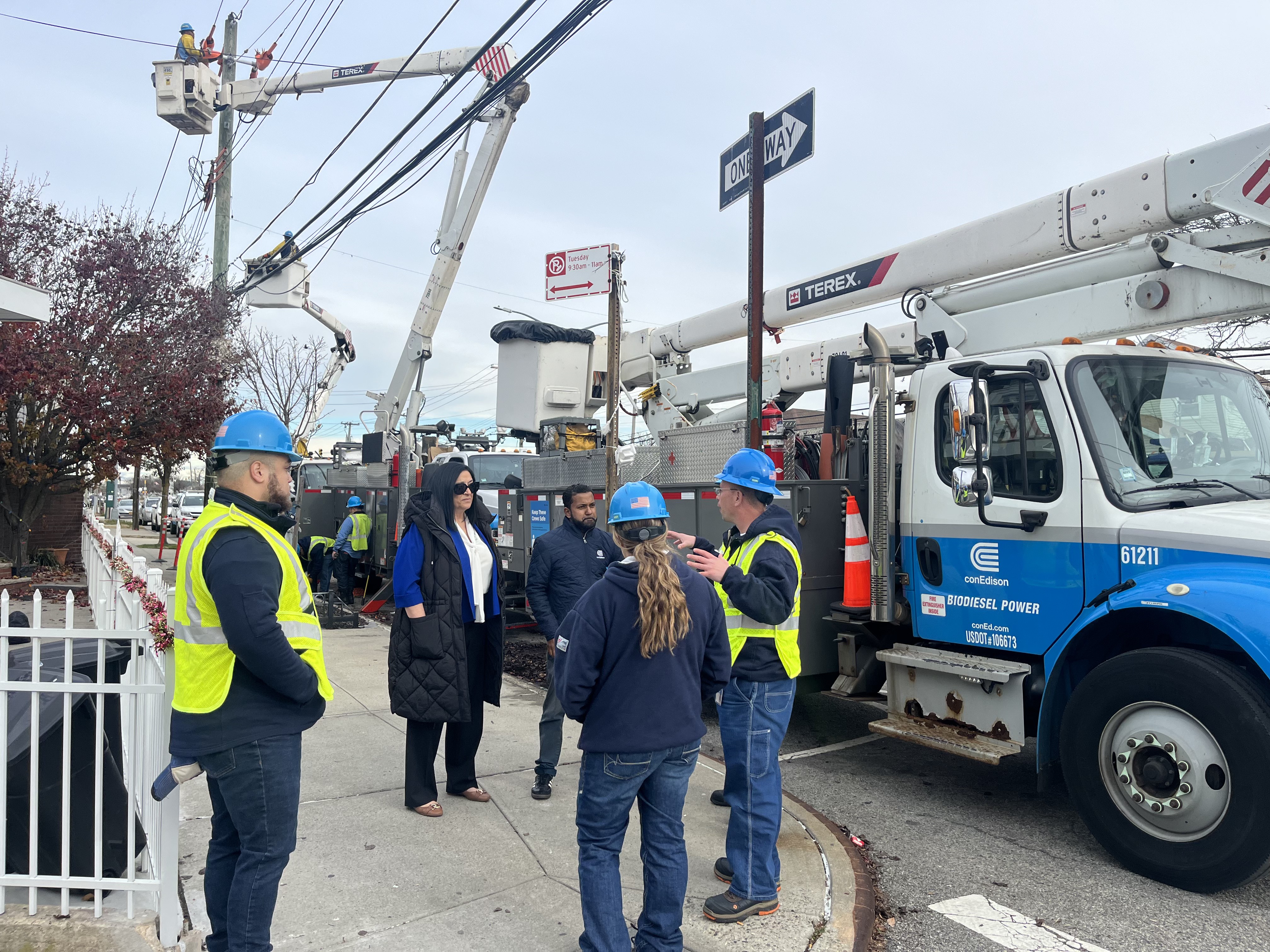 Council Member Joann Ariola with Con Edison repair crews during an earlier power outage in her district.
