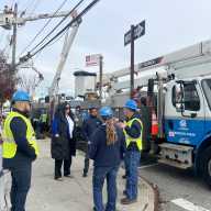 Council Member Joann Ariola with Con Edison repair crews during an earlier power outage in her district.