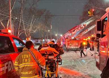 The FDNY fought a 2-alarm fire on the Jamaica Bay waterfront in Rockaway Beach that displaced at least one family, according to the Red Cross.