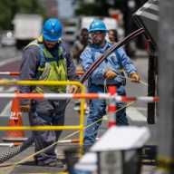 Con Edison repair crews worked through the early morning hours to restore power to more than 5,000 customers in Middle Village and Maspeth.