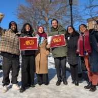 Senate District 12 candidate Aber Kawas with a number of DSA candidates and elected officials at Woodside's Doughboy Plaza last week. Photo via Aber for Senate.
