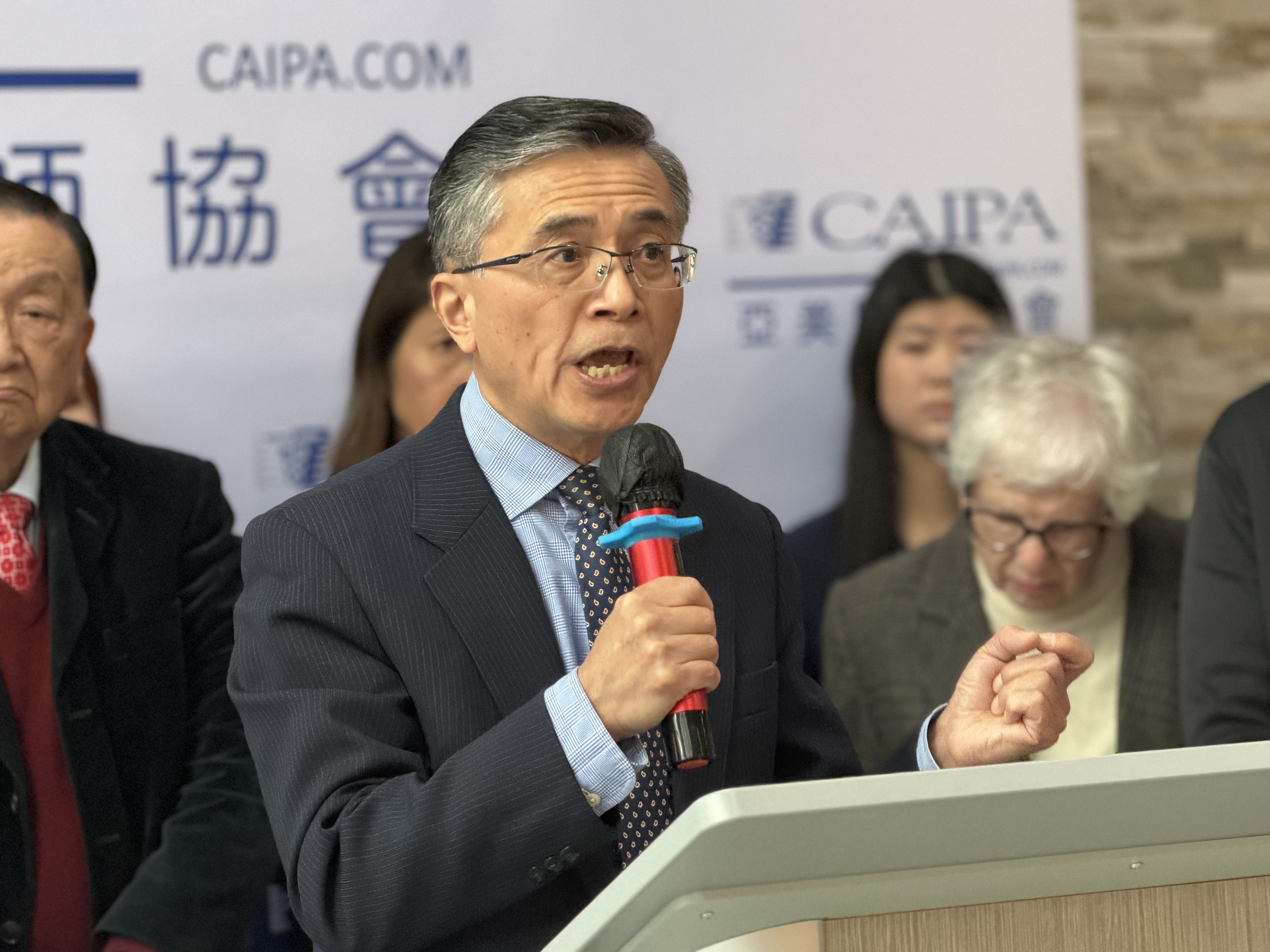 Jing Shui, chief operating officer of the Chinese American Independent Practice Association, stressed the impact of the Trump Administration’s cuts to Medicare and Medicaid on community-based health care providers during a rally at the CAIPA office, in Flushing, on March 3.